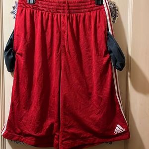 Gently loved men red and white stripes athletic Adidas shorts. Size XL